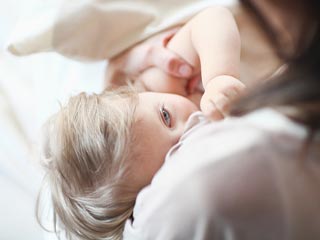 Breastfeeding Prepares Baby's Belly for Solid Food
