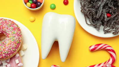 Foods You Should Never Give Your Kids To Save Their Teeth