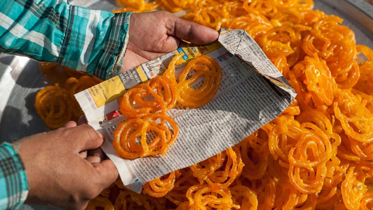 Newspaper Use To Pack Street Food India