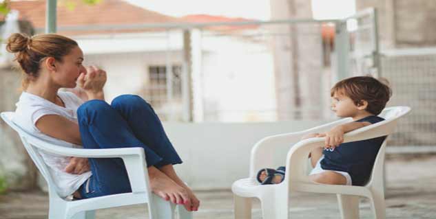 Mother talking to her kid अपने बच्चे से बात करती हुई मां