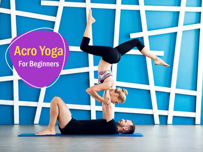 Premium Photo | Young couple practicing acro yoga on mat in studio together  acroyoga couple yoga partner yoga