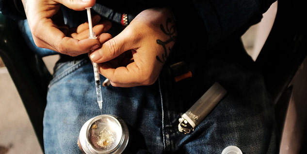 Person_consuming_opium