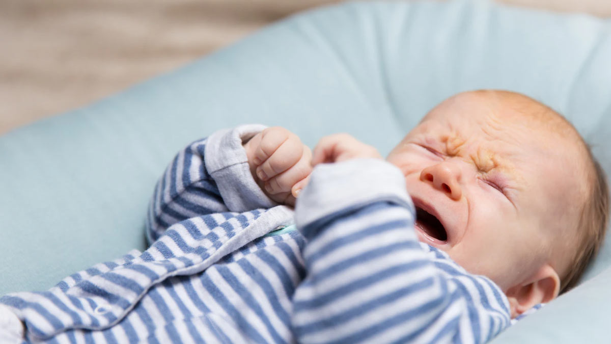 overfeeding baby signs 