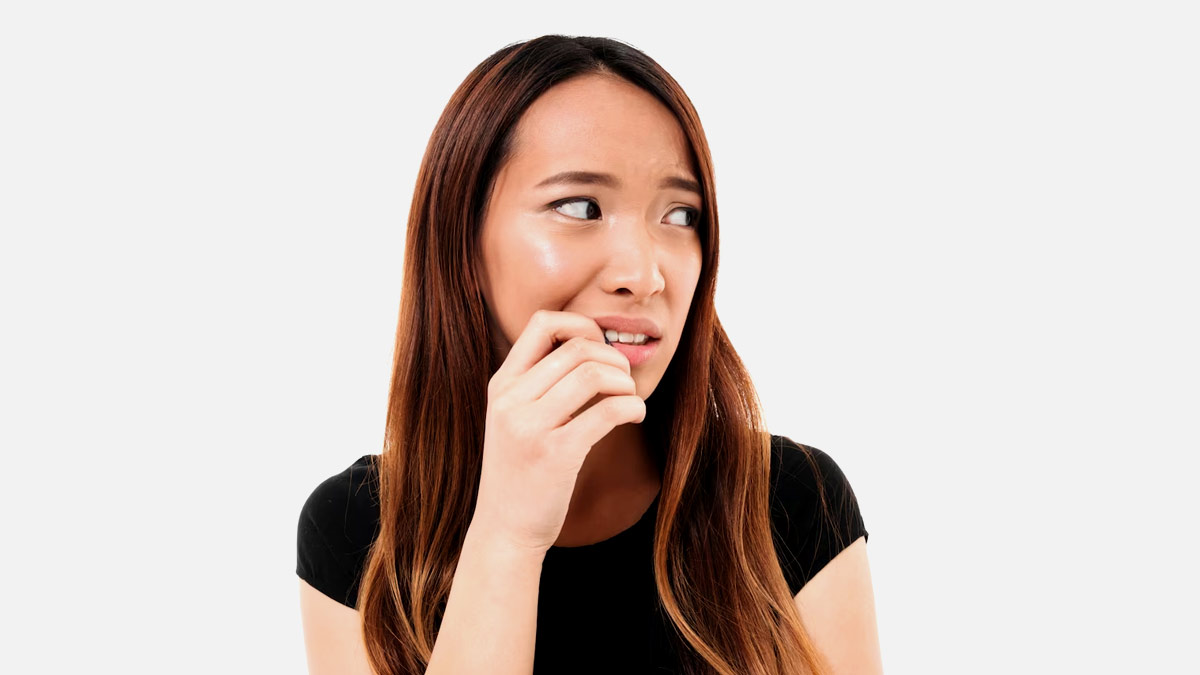 How can a person stop biting their nails?