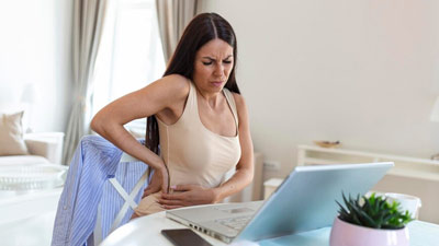 Is There A Link Between Large Breasts And Back Pain? Expert Shares Insights