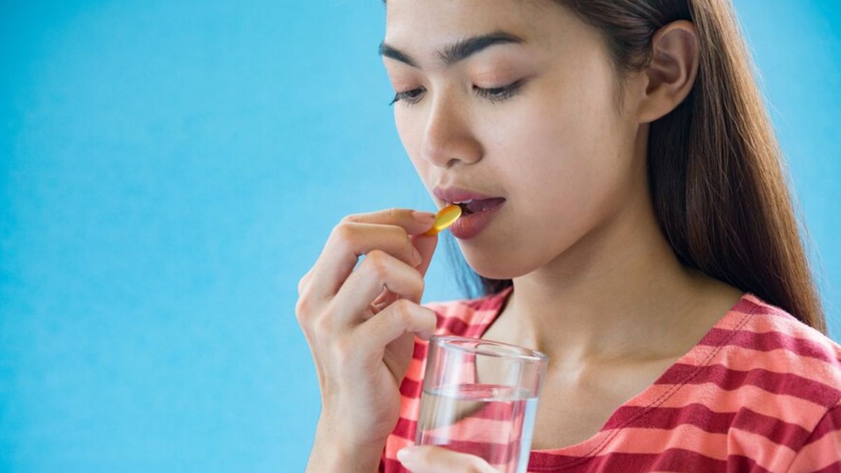 women taking medicine