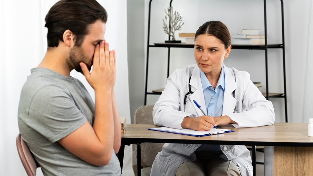 man-talking-to-doctor