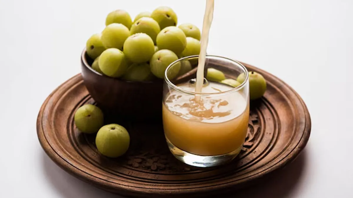 From Lowering Cholesterol To Preventing Liver Damage: Health Benefits of Amla Juice Shot
