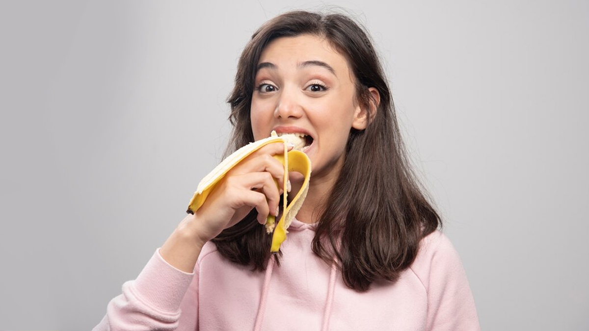 person-eating-banana