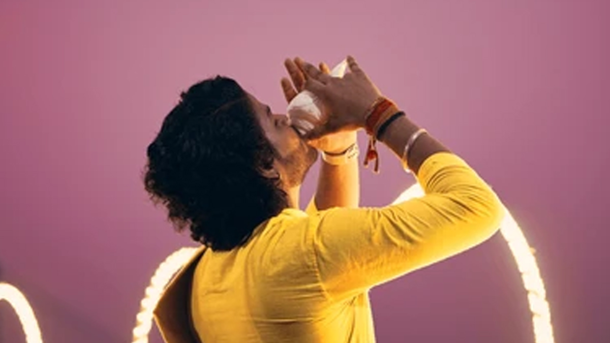 person-blowing-shankh