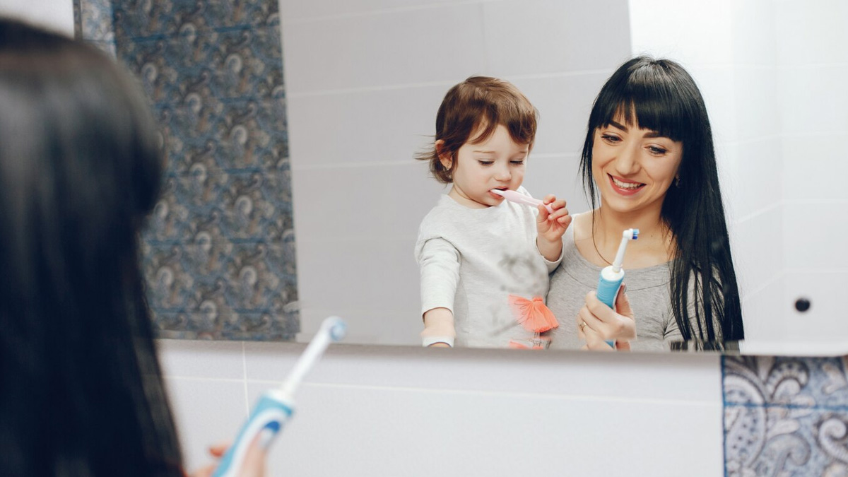 parent-brushing-with-baby