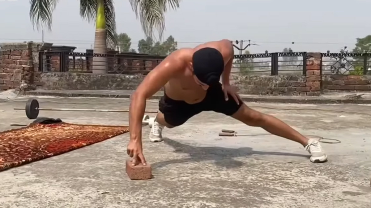 Kuwar Amritbir Singh working out in his homemade gym 4
