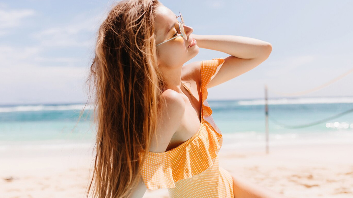 woman enjoying beach