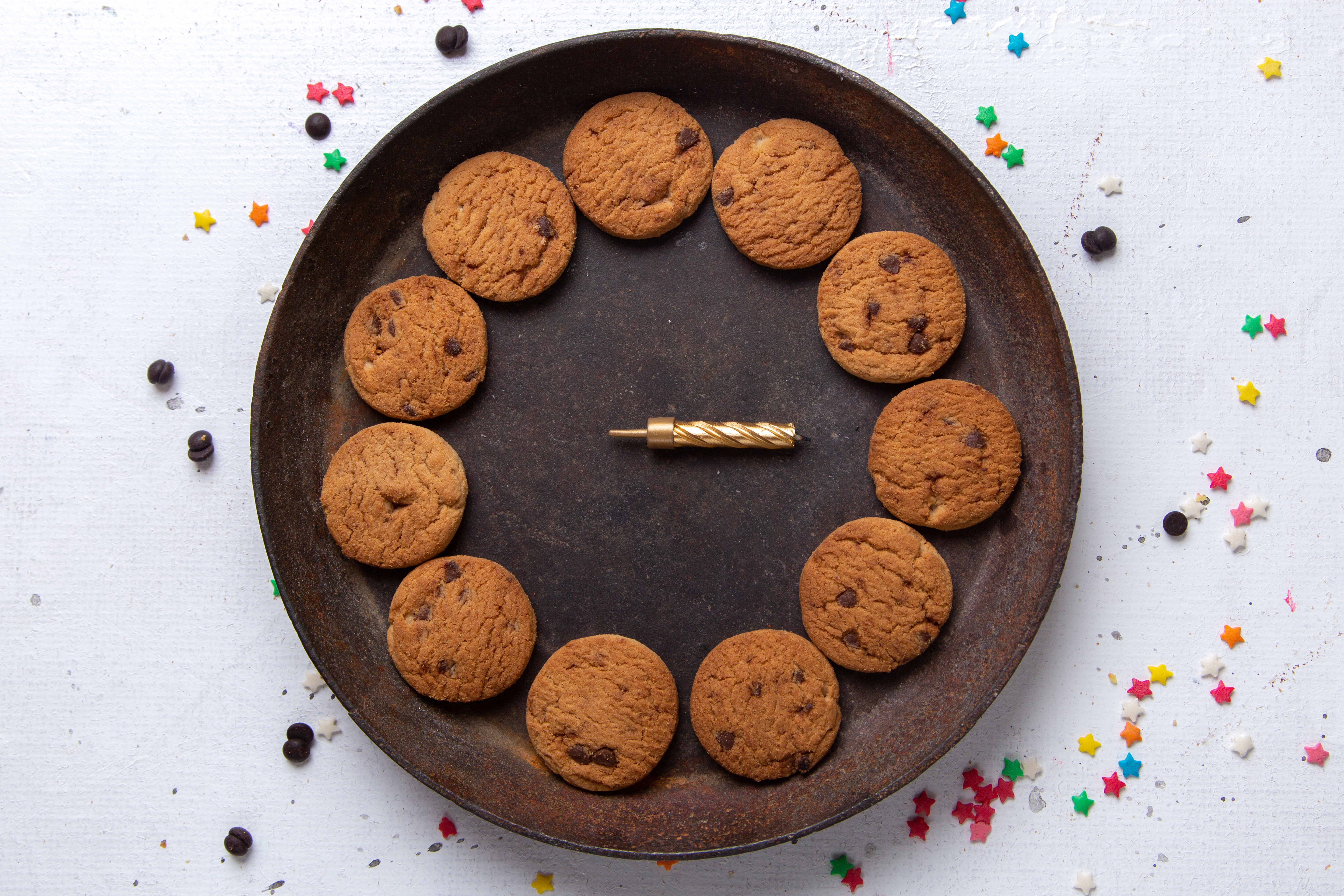 top-view-delicious-chocolate-cookies-inside-brown-round-plate-white-background-cookie-biscuit-sugar-sweet