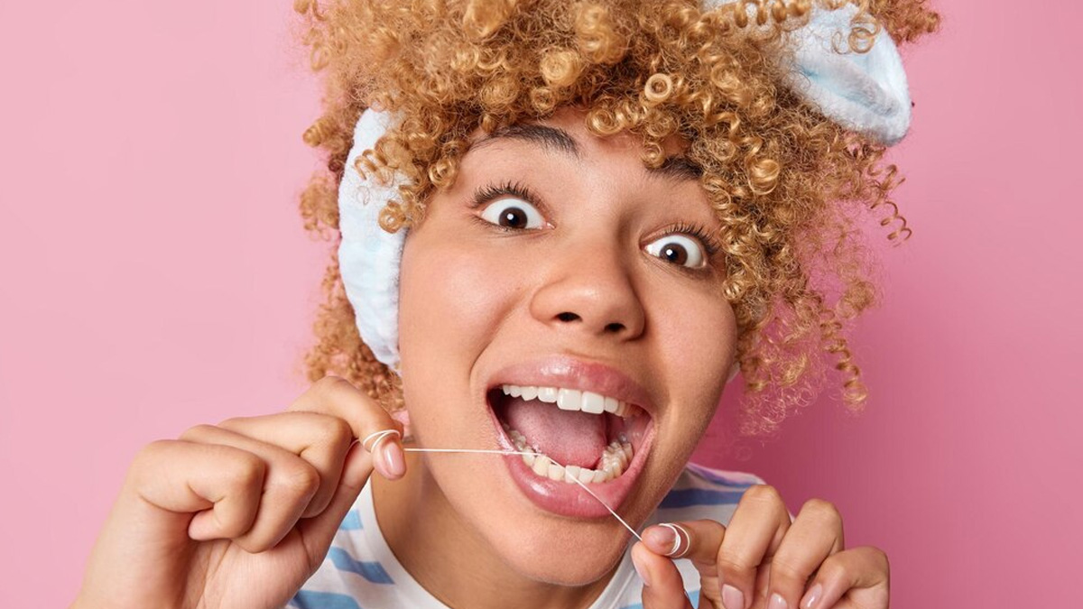 Flossing Create Space Between Teeth