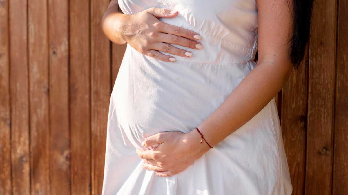 signs of pregnancy with twins 01