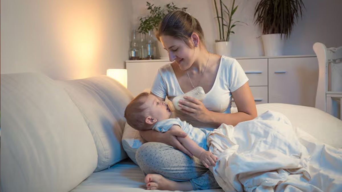 feeding a sleeping baby