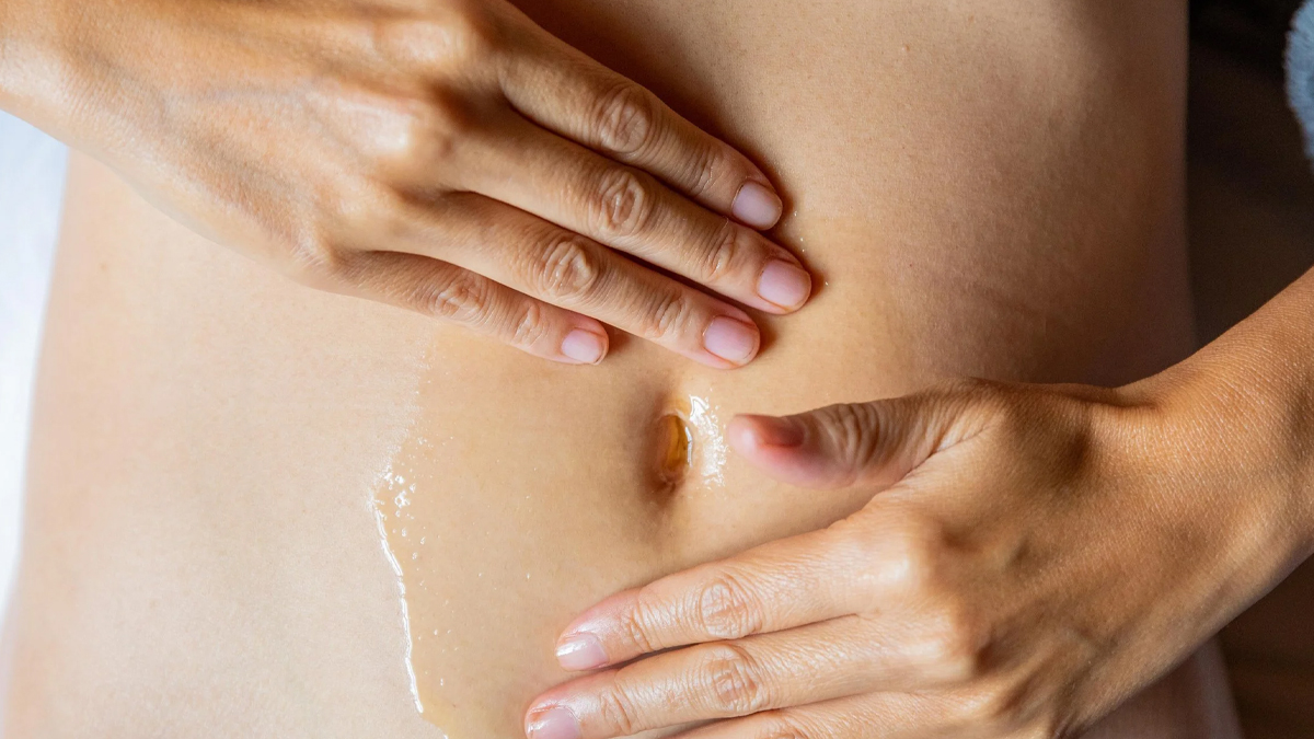 navel-oiling-hair-growth