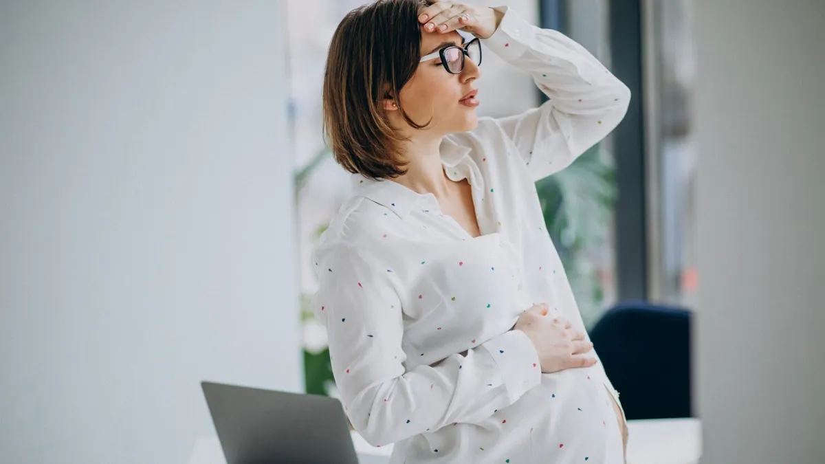 signs before labor pain