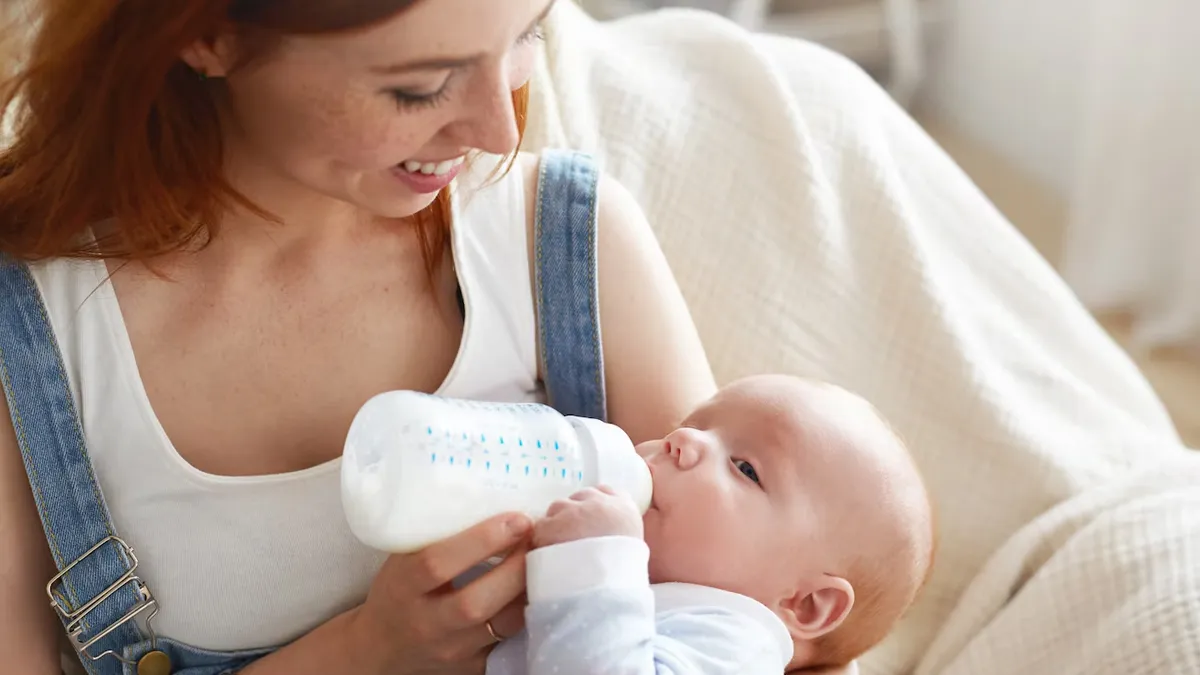 baby spitting up milk after feeding