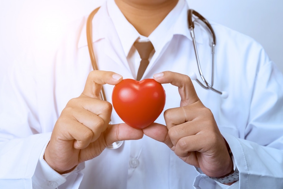 doctor-holding-red-heart_38810-5