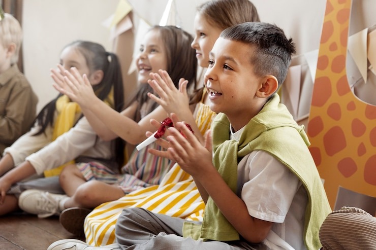 side-view-smiley-kids-applauding