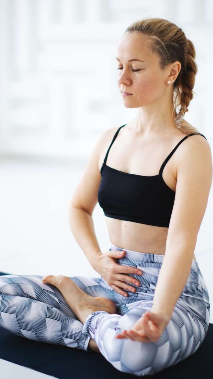 6 Yoga Poses That Can Help Eliminate the Effects of Burnout | Glamour