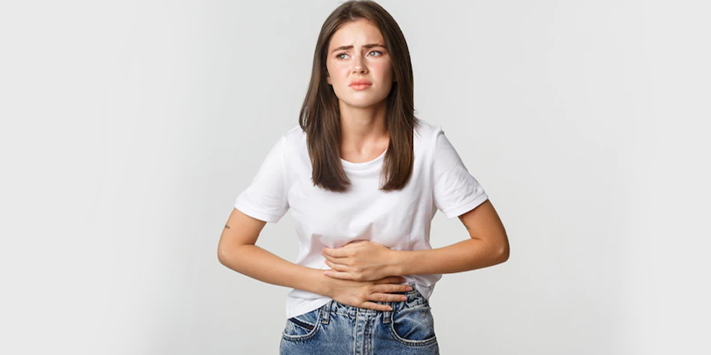 Signs Your Bloating Is A Symptom Of Something More Serious